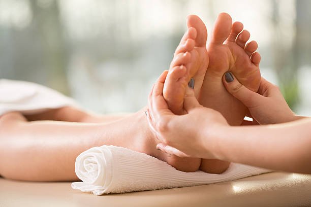 Foot reflexology massage benefits for relaxation